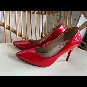 Jady Rose red high heel pumps